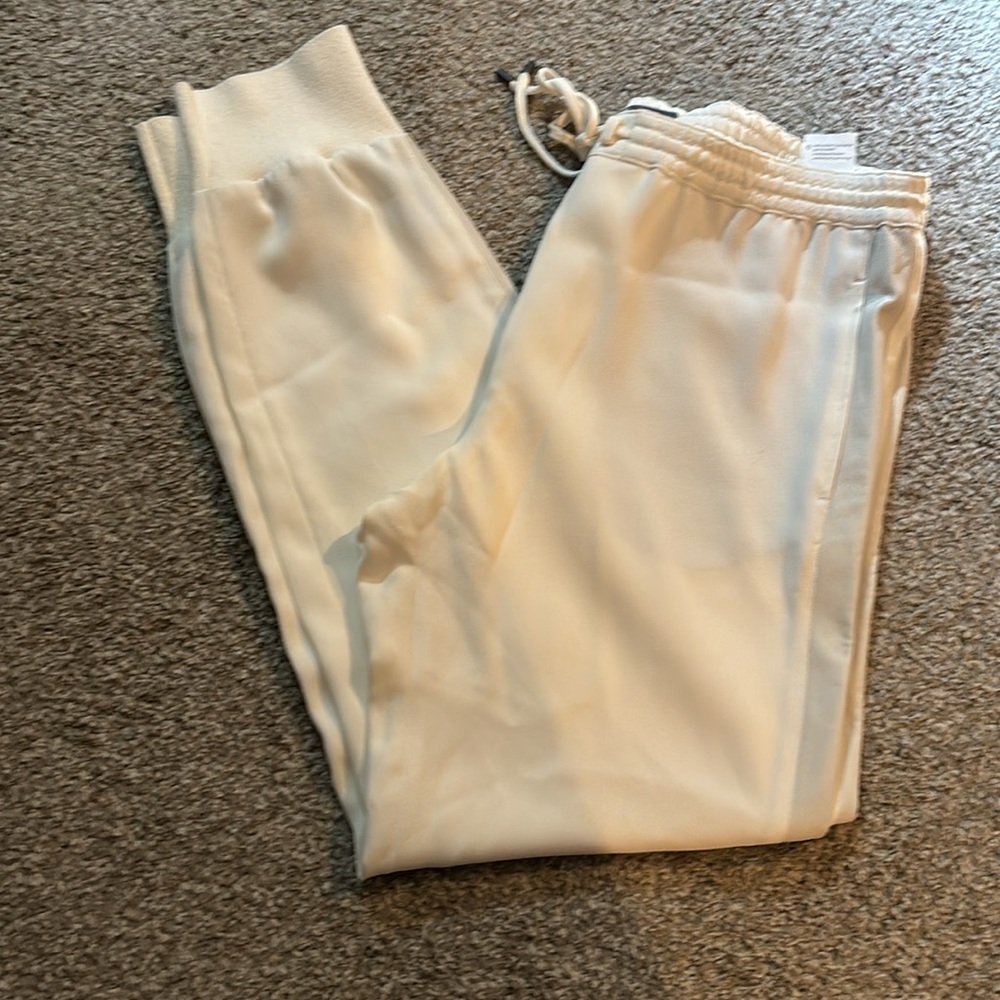 Vince silky cream jogger pants with leather side detail - Picture 1 of 7
